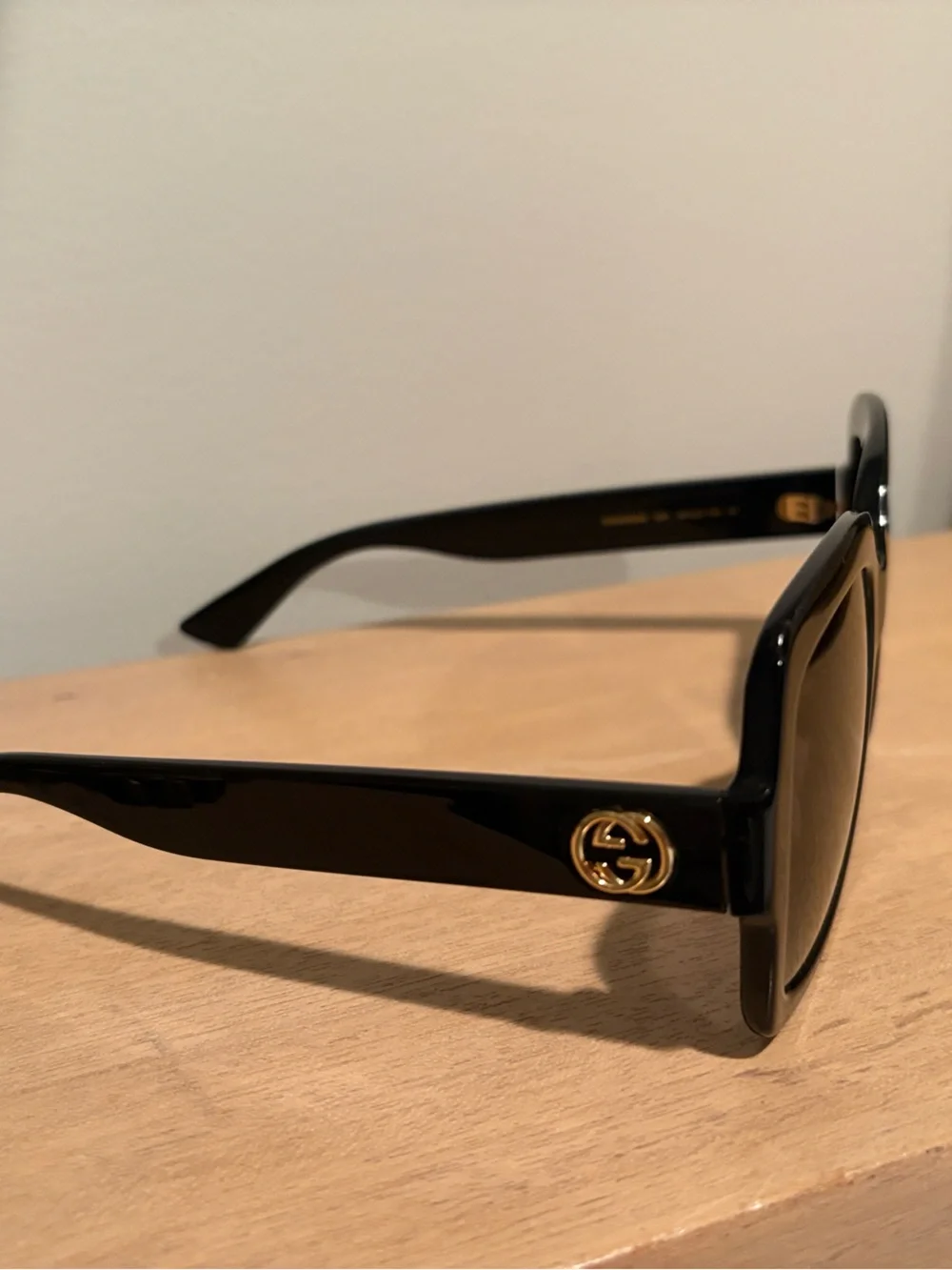 Gucci Black Sunglasses with Gold GG Accent